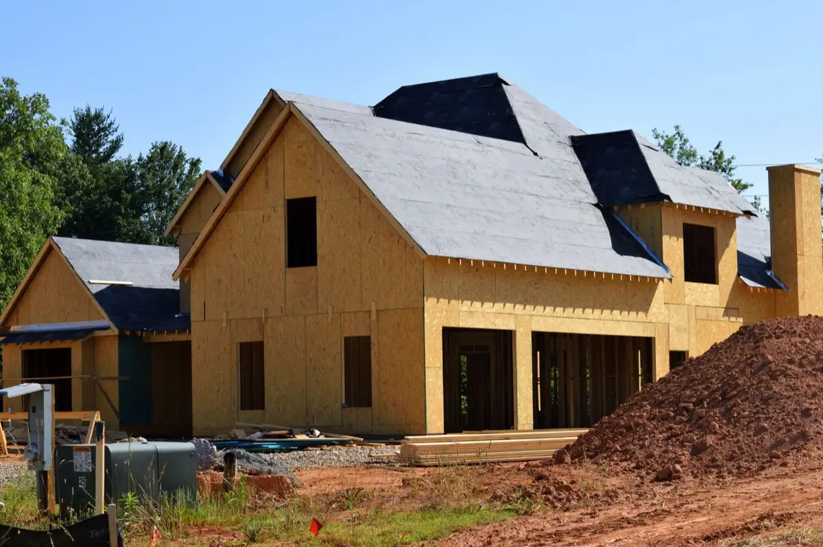 House with new roof decking and synthetic underlayment during a roof replacement in Spring Hill, FL